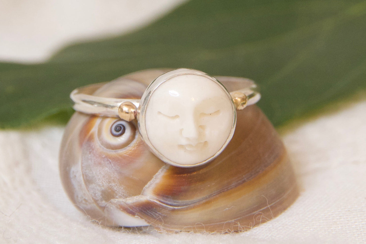 Sterling silver bone and brass ring