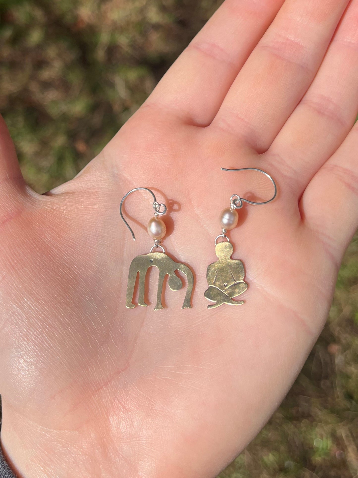 handmade people cut out of brass n sterling silver hooks