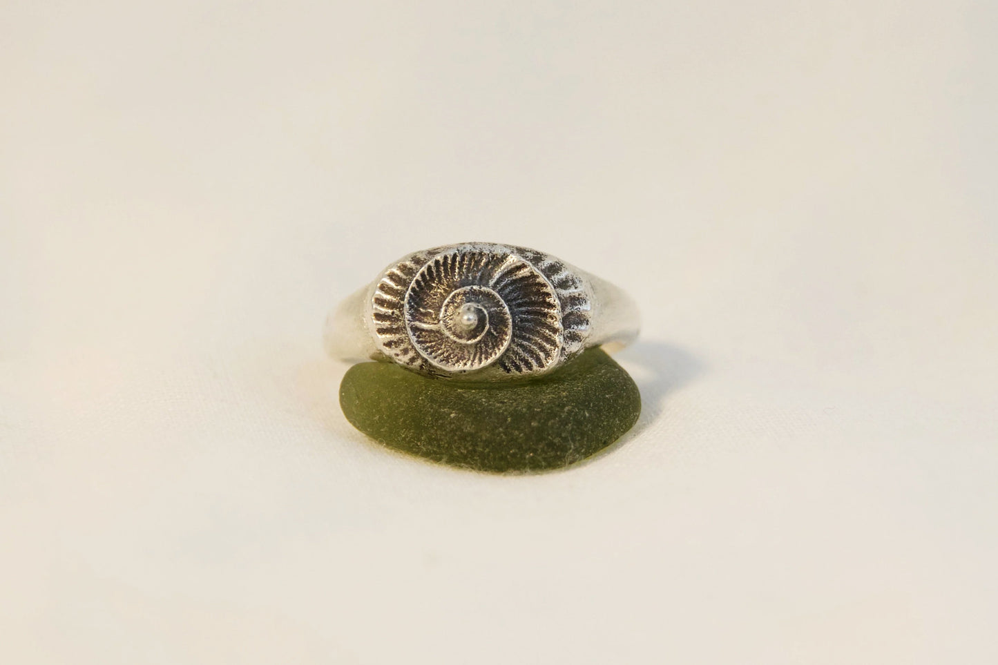 Sterling silver ring with an ammonite impression 