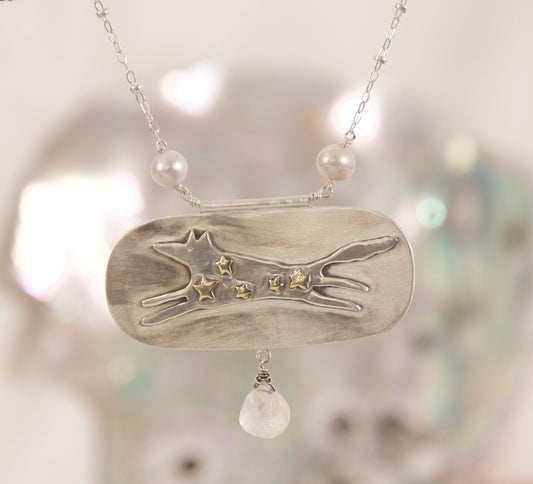 Sterling silver dog jumping necklace