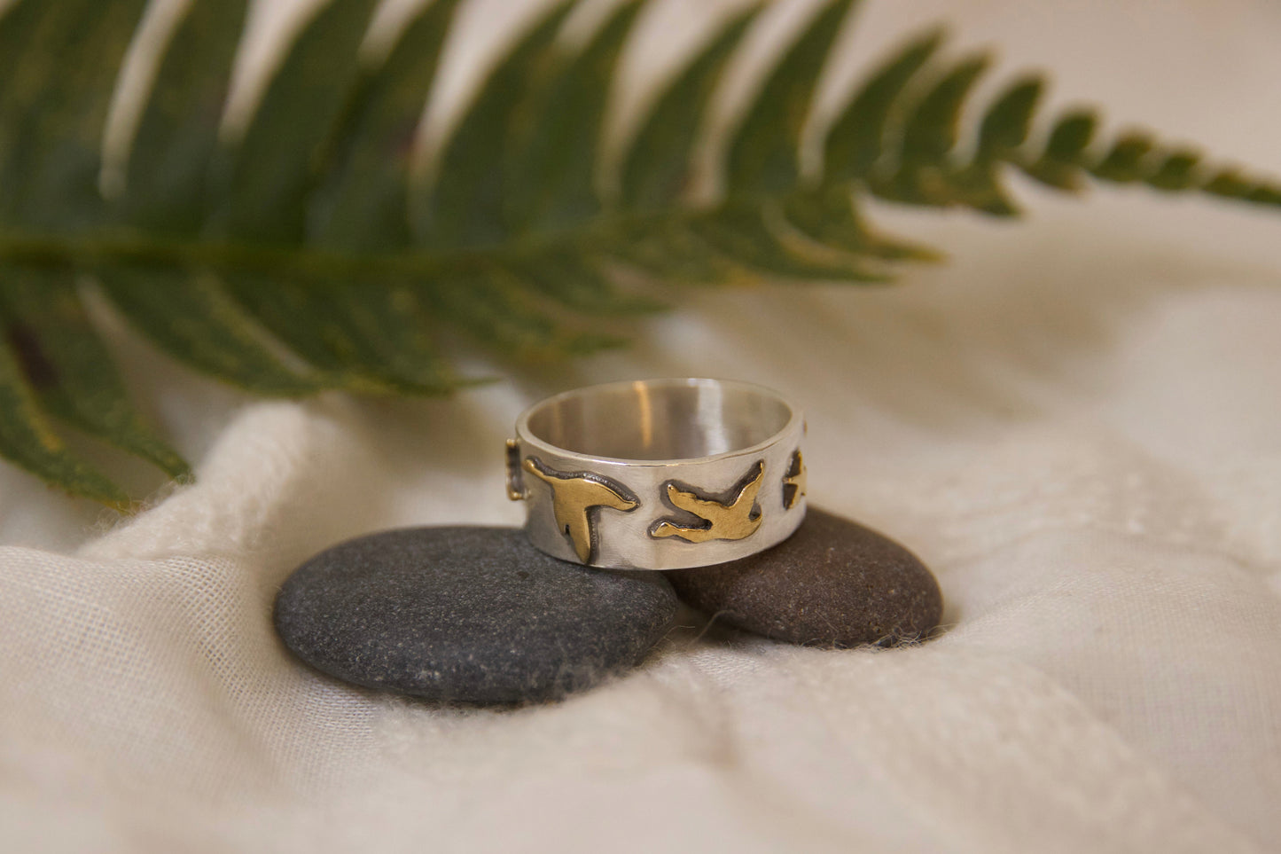 Handmade brass geese flying towards a artfully cut star one of a kind ring
