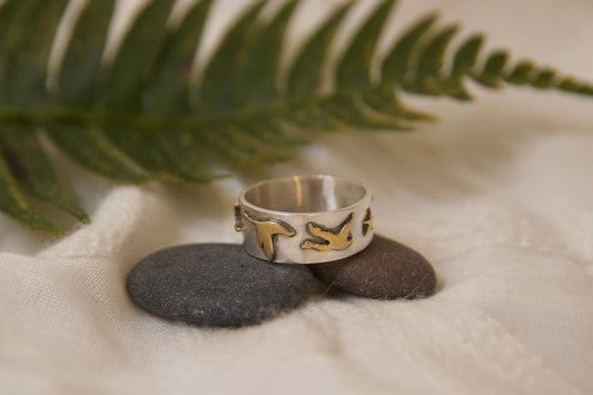 Handmade brass geese flying towards a artfully cut star one of a kind ring