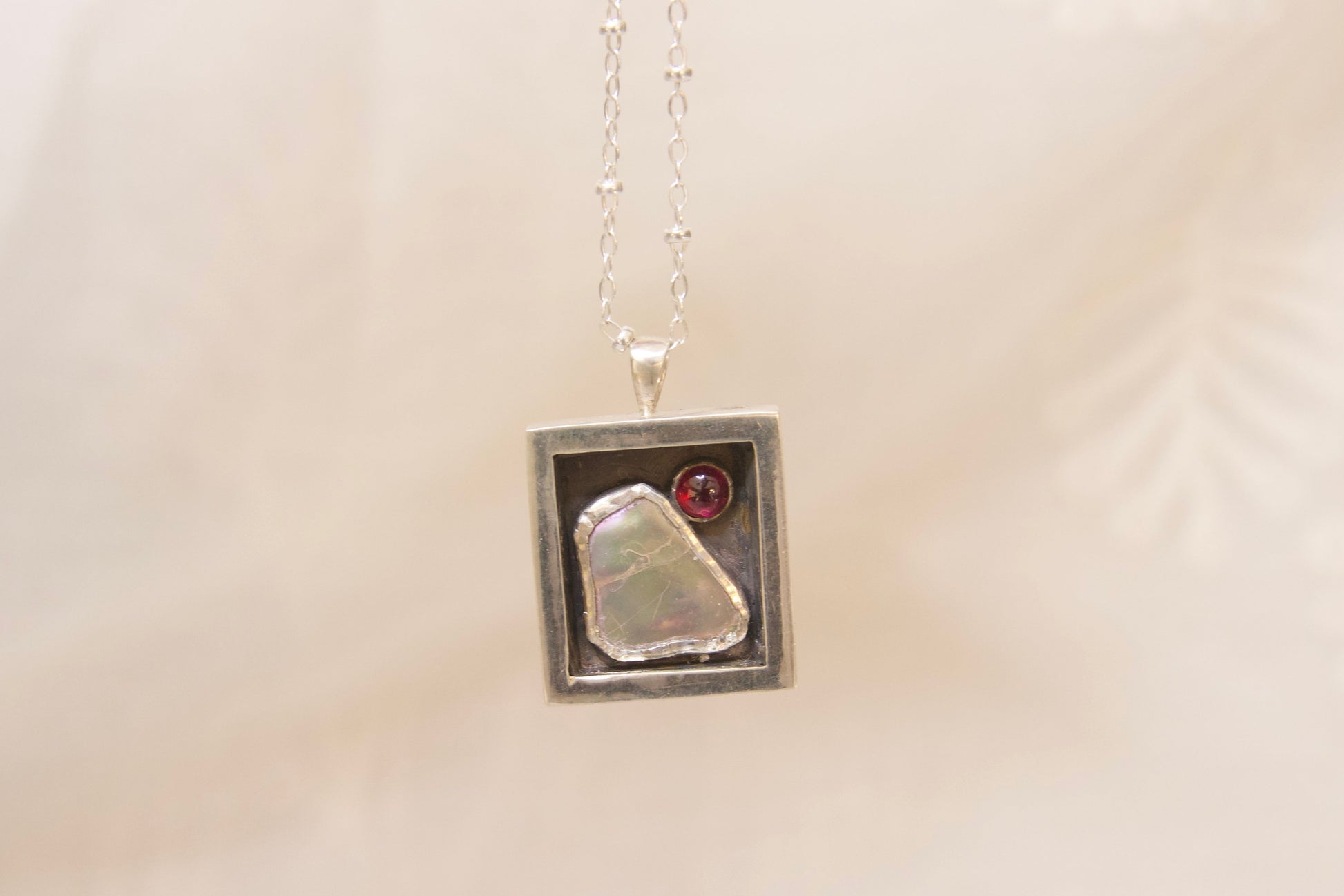Sterlings silver garnet and abalone  jewelry