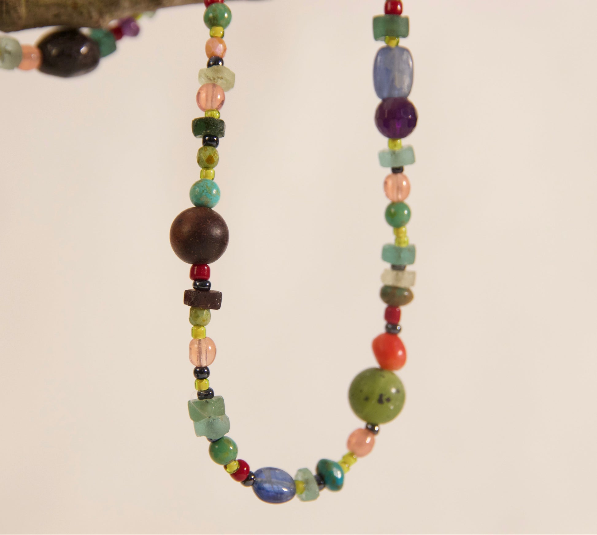 Colorful beaded necklace on a white background