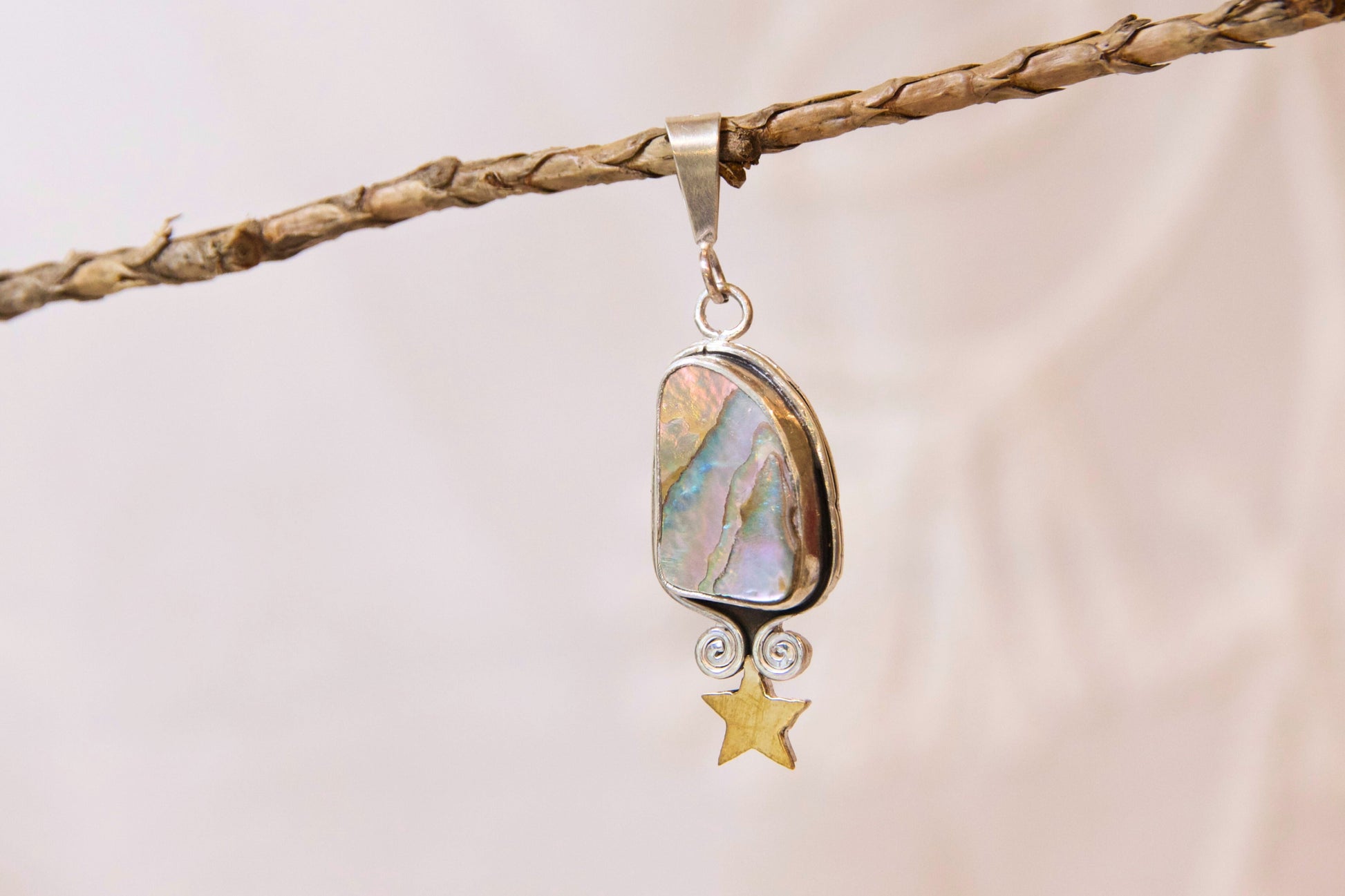 One of a kind sterling silver and brass pendant 