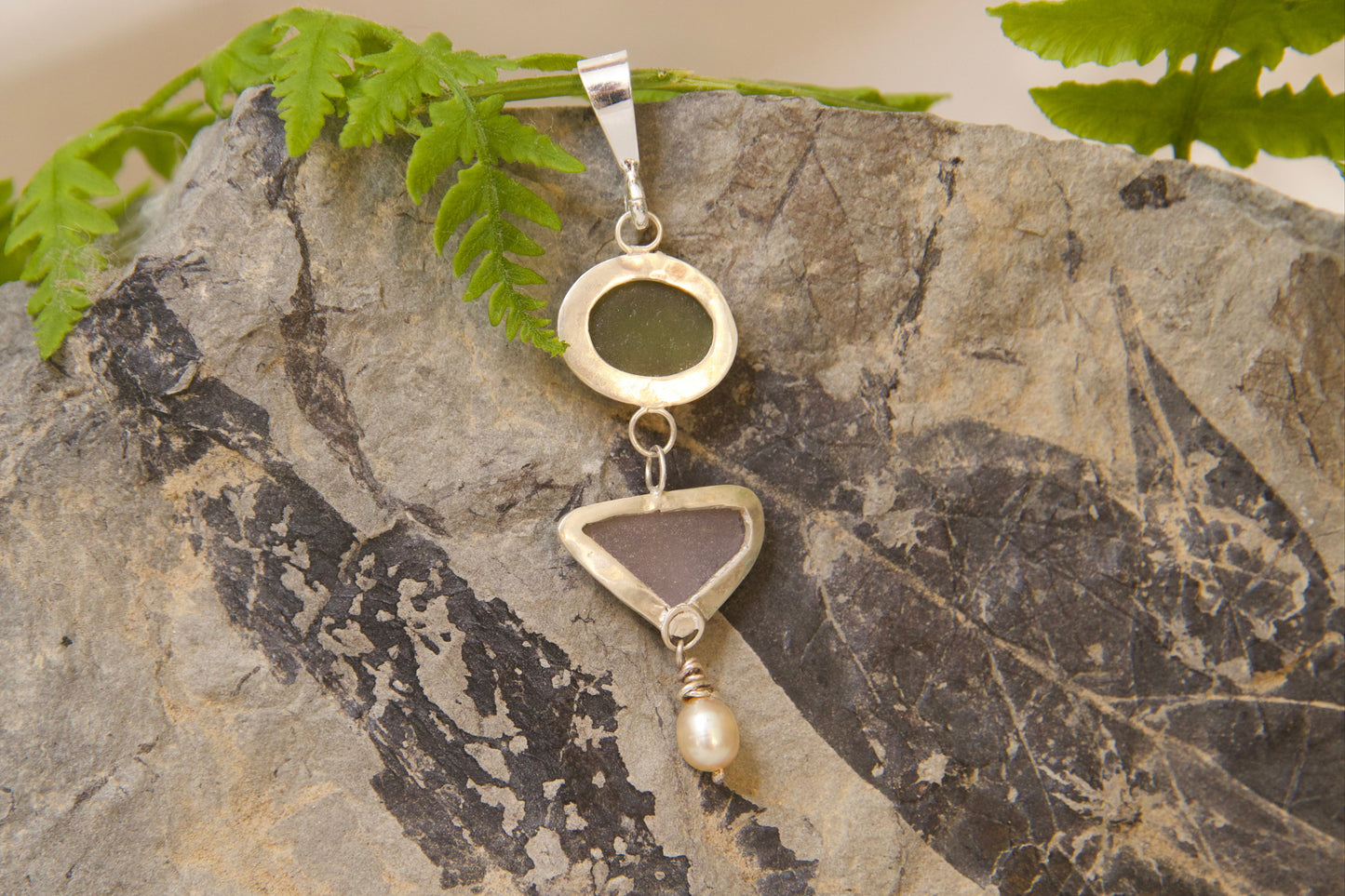 Back of sea glass pendant