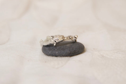 Handcrafted unique squiggle fish ring
