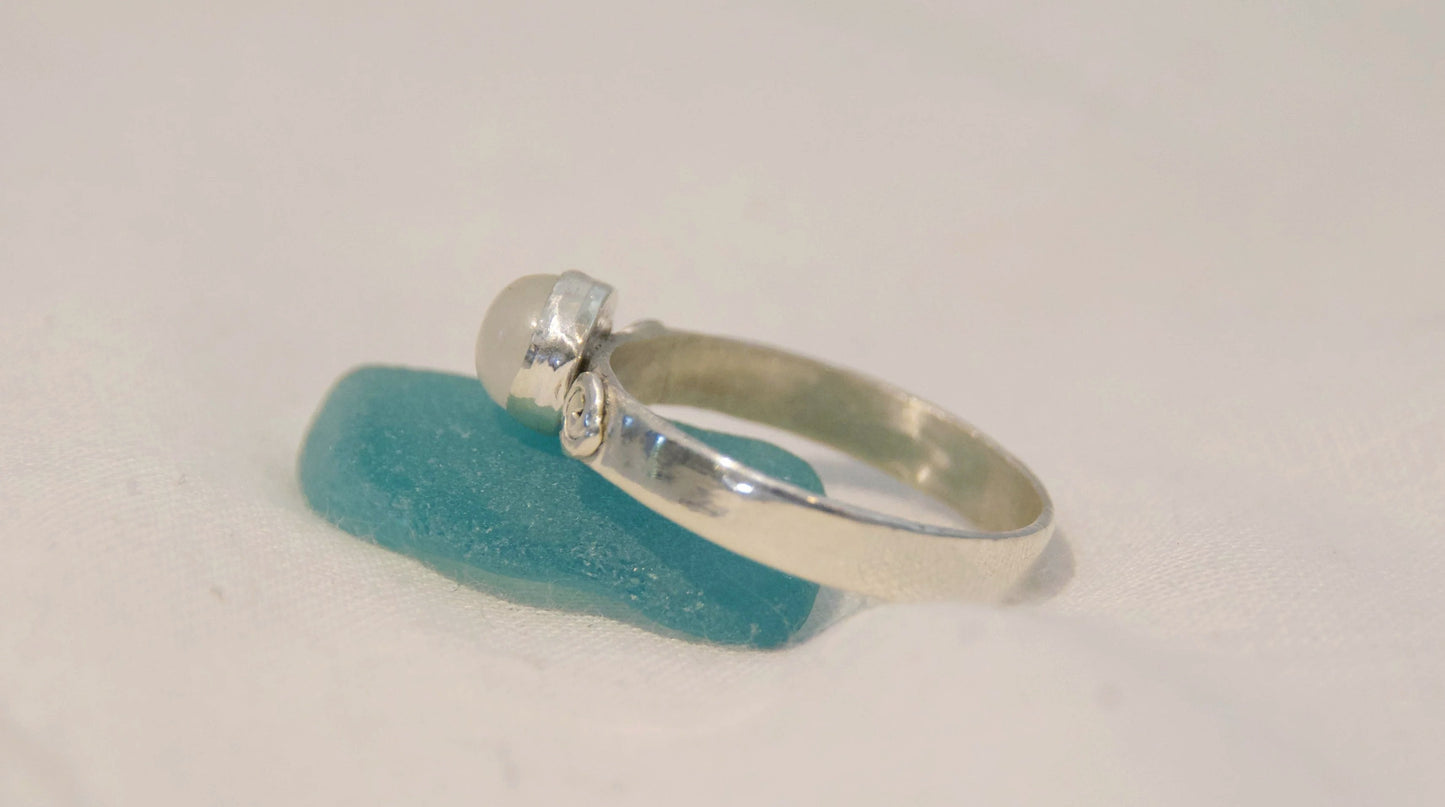 Sterling silver ring with a moonstone center stone